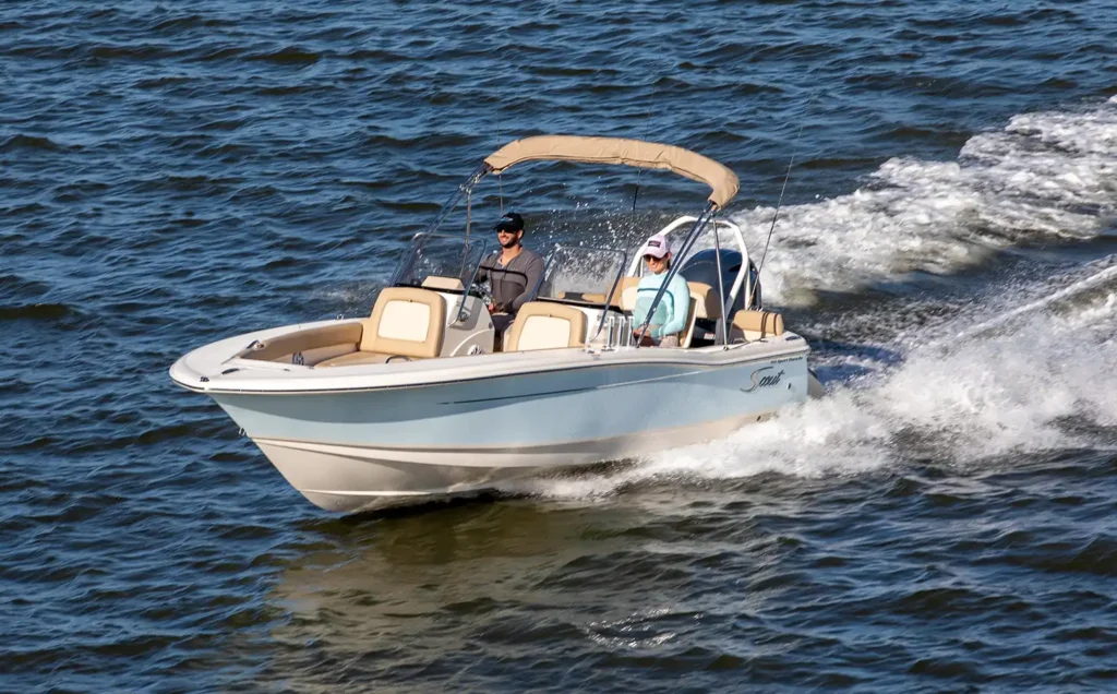 Small center console boat cruising shallow Chesapeake Bay waters